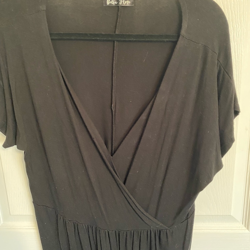 Elegant Black Wrap Top Romper with a VNeck and very stretchy, Size Large EUC